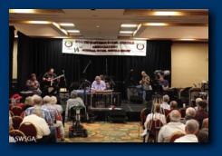 Doug & the band under the 14th annual banner